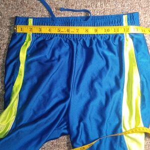 Blue Athletic Shorts with Neon Yellow Stripes